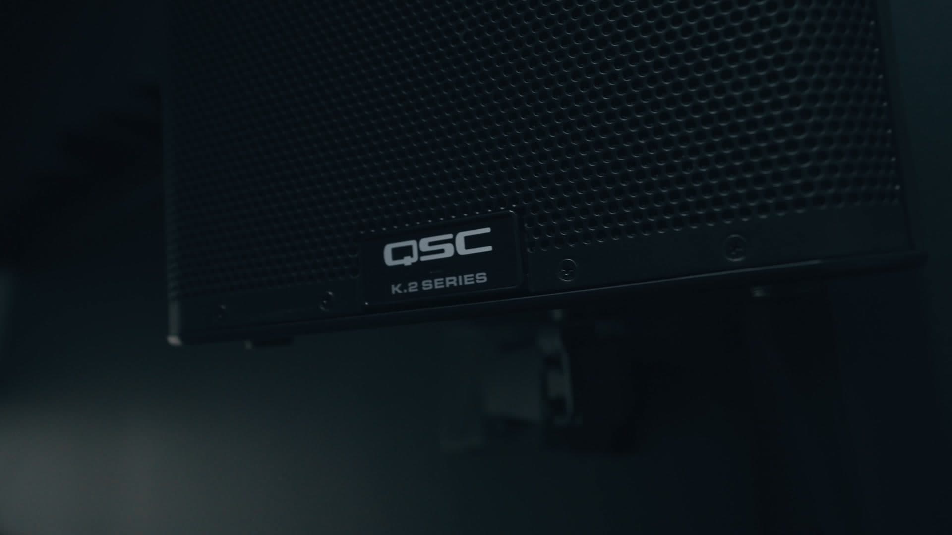 QSC K.2 series speakers mounted on stage